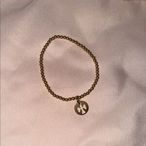 Gold Beaded Bracelet with Angel Charm